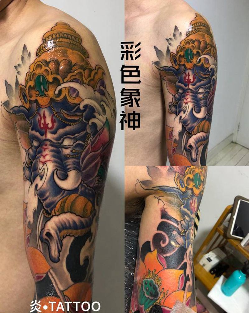 大臂象神纹身图片_手臂纹身图案