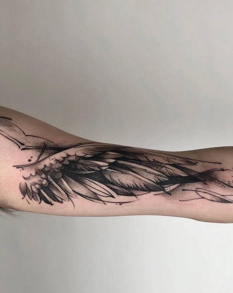 翅膀与竹叶纹身图片_手臂几何翅膀纹身图案