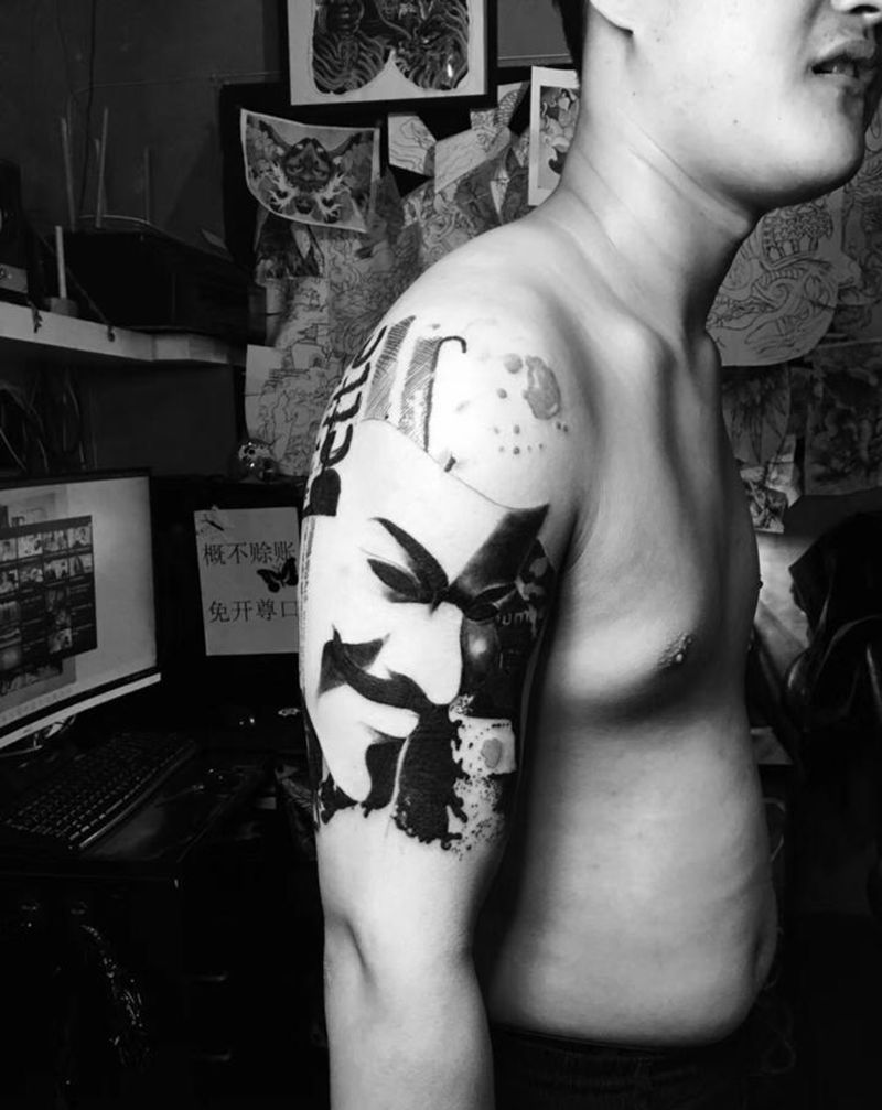 面具纹身图片_手臂欧美写实纹身图案