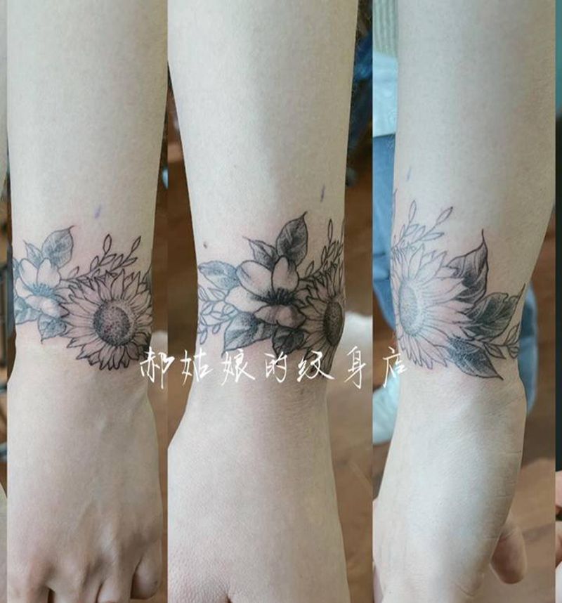 素花疤痕遮盖纹身图片_手臂点刺向日葵植物叶子纹身图案