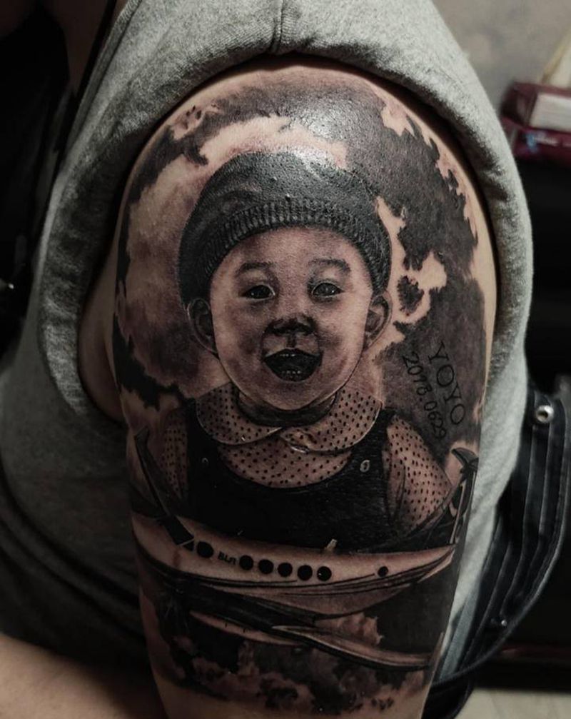 写实肖像纹身图片_手臂欧美写实纹身图案