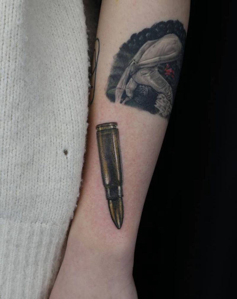 彩色写实子弹纹身图片_手臂欧美写实纹身图案