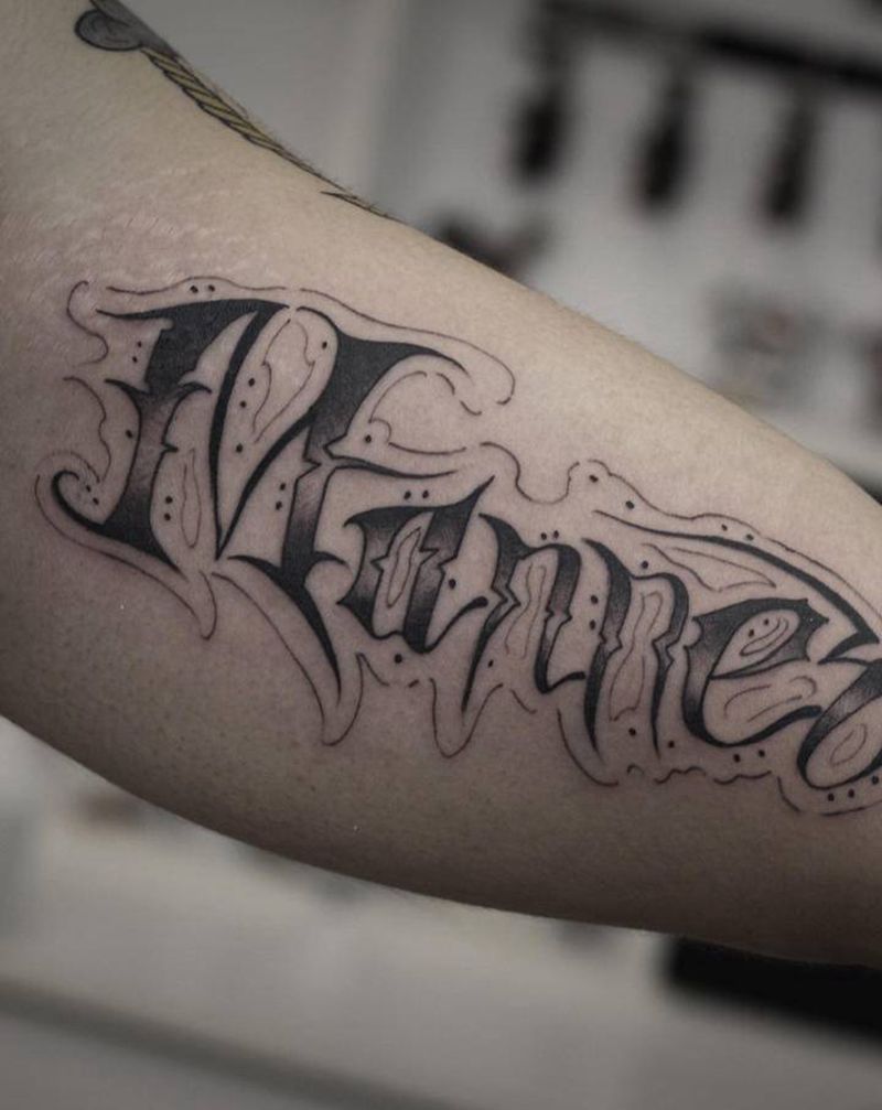 花体纹身图片_手臂纹身图案