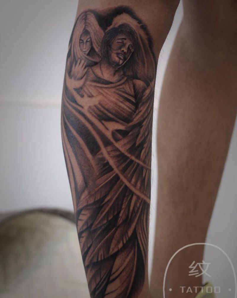 守护纹身图片_腿部纹身图案