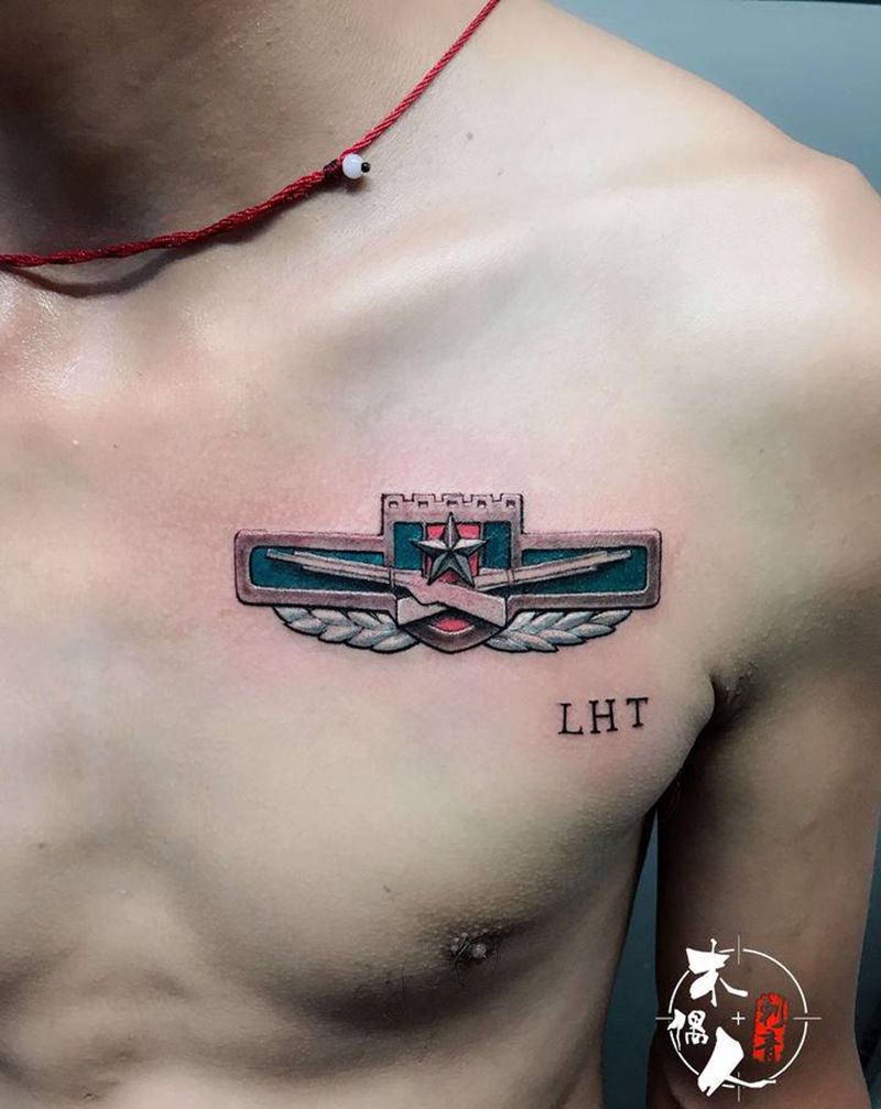 胸章纹身图片_胸部纹身图案