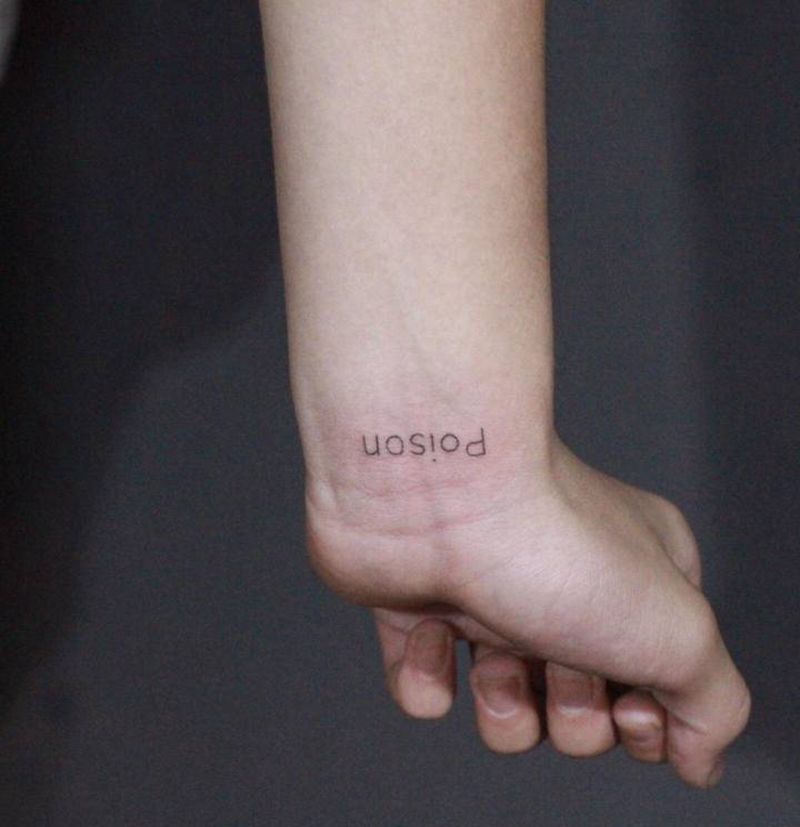 字体小作品纹身图片_手臂花体字纹身图案