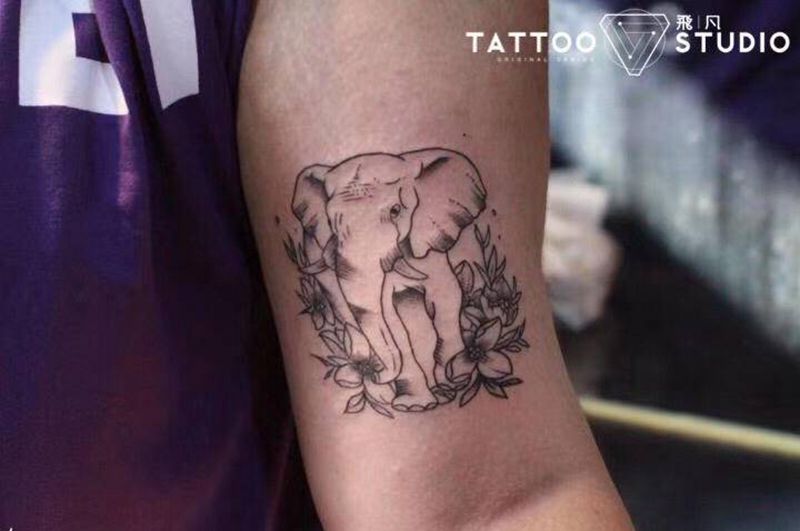 简单单纹身图片_手臂点刺纹身图案