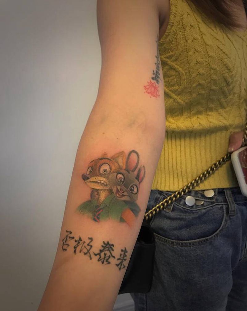 朱迪与尼克纹身图片_手臂纹身图案