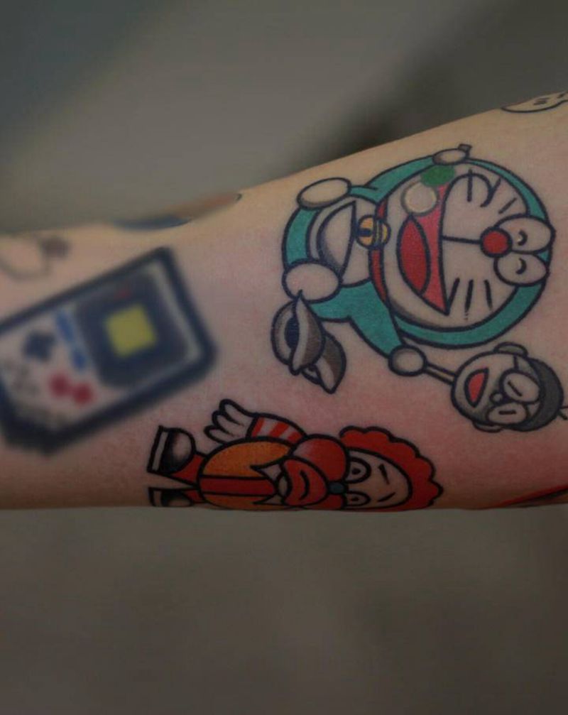 卡通纹身图片_手臂纹身图案