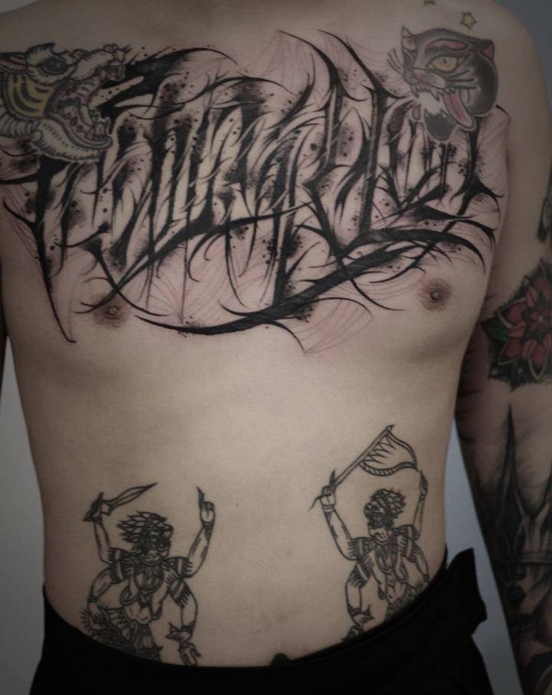 花体纹身图片_胸部纹身图案