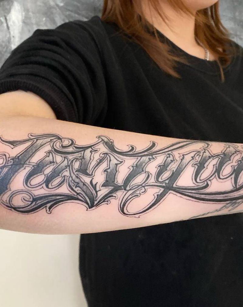 花体字纹身图片_手臂花体字纹身图案