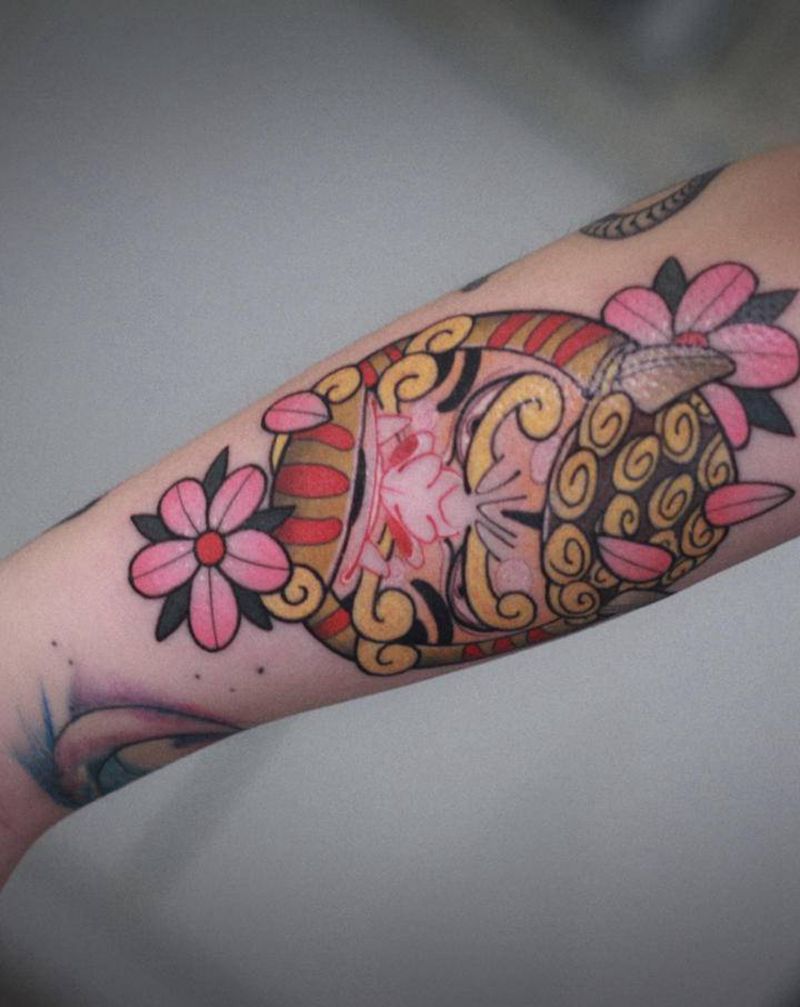 达摩蛋纹身图片_手臂纹身图案