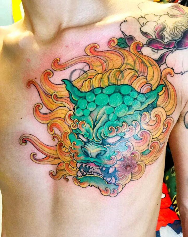 唐狮未完待续纹身图片_胸部纹身图案