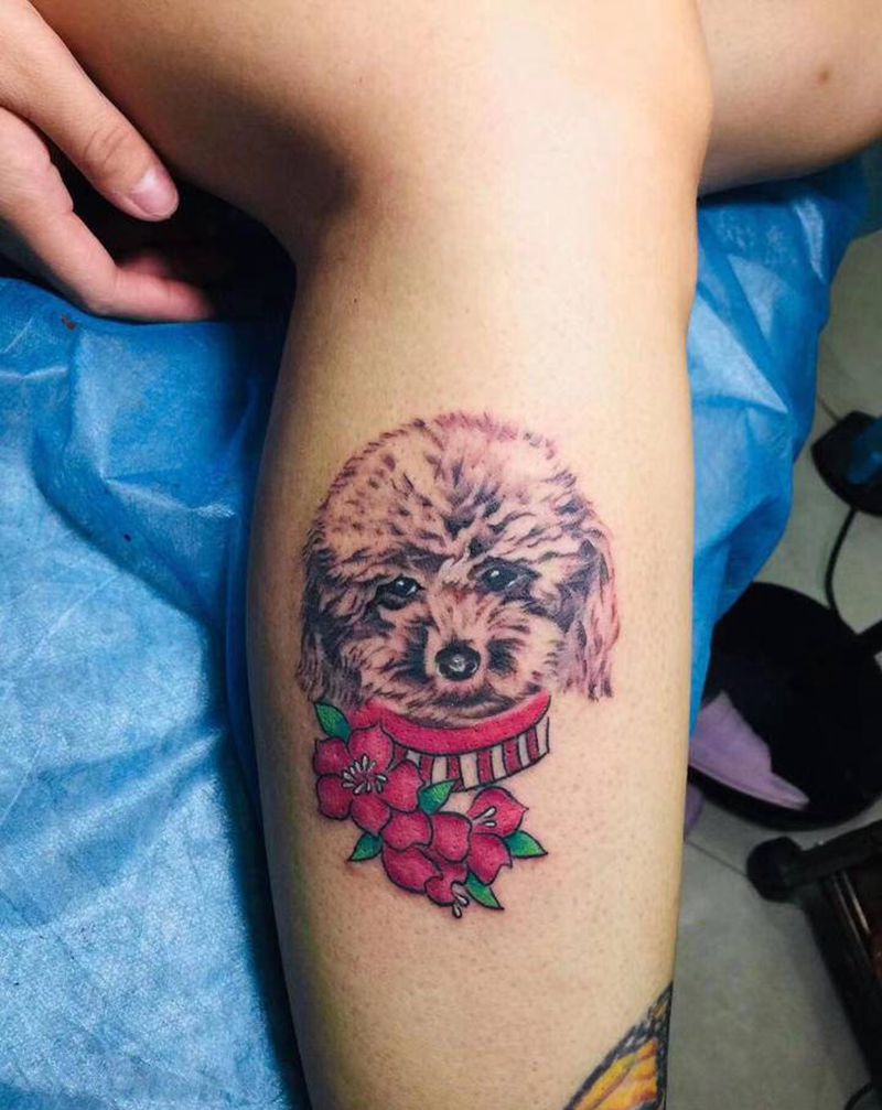 泰迪狗狗纹身图片_腿部纹身图案