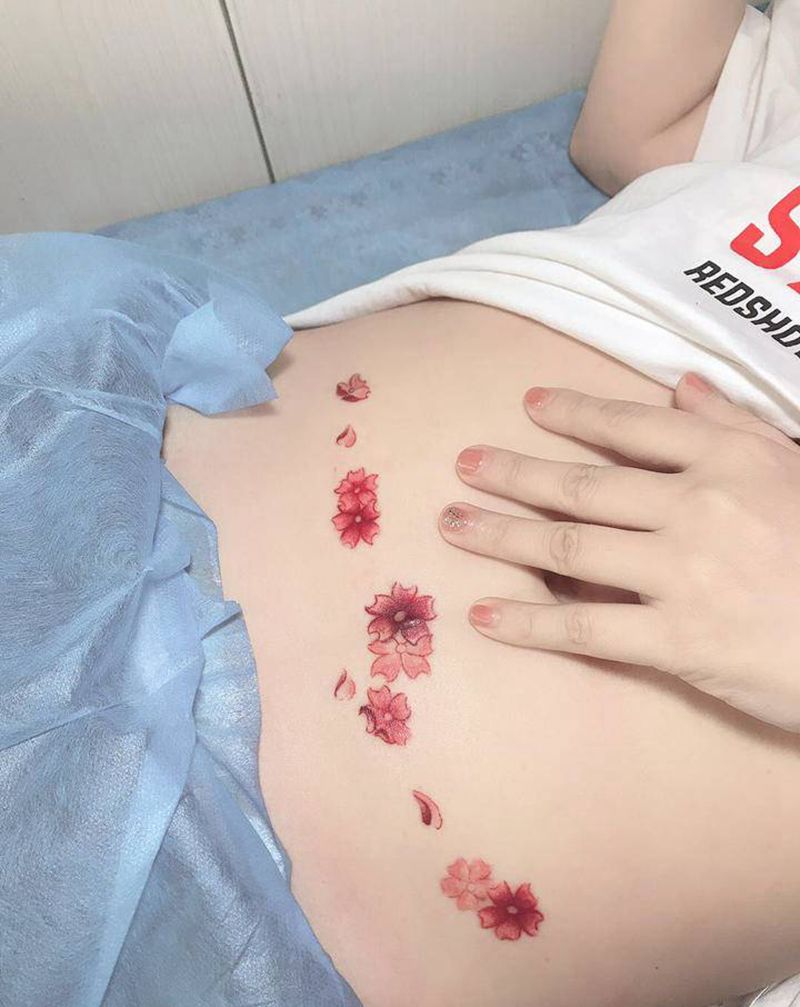 遮盖微创手术刀口纹身图片_腹部纹身图案