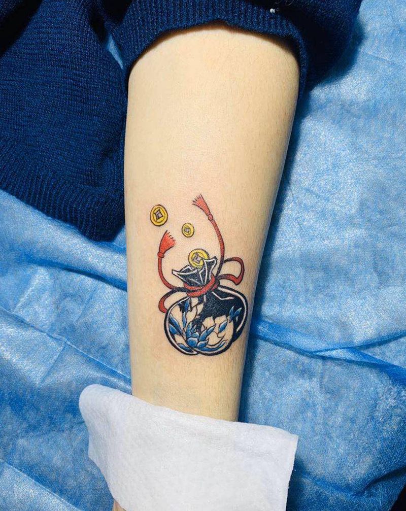 钱袋子纹身图片_手臂纹身图案