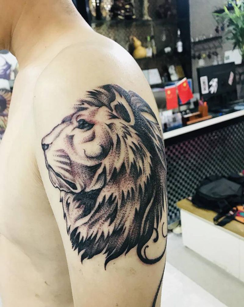 狮子纹身图片_手臂纹身图案