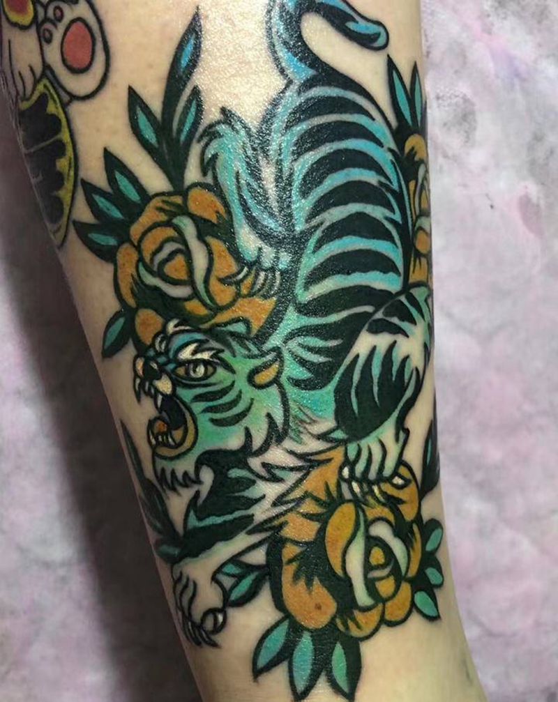 小脑斧纹身图片_腿部纹身图案