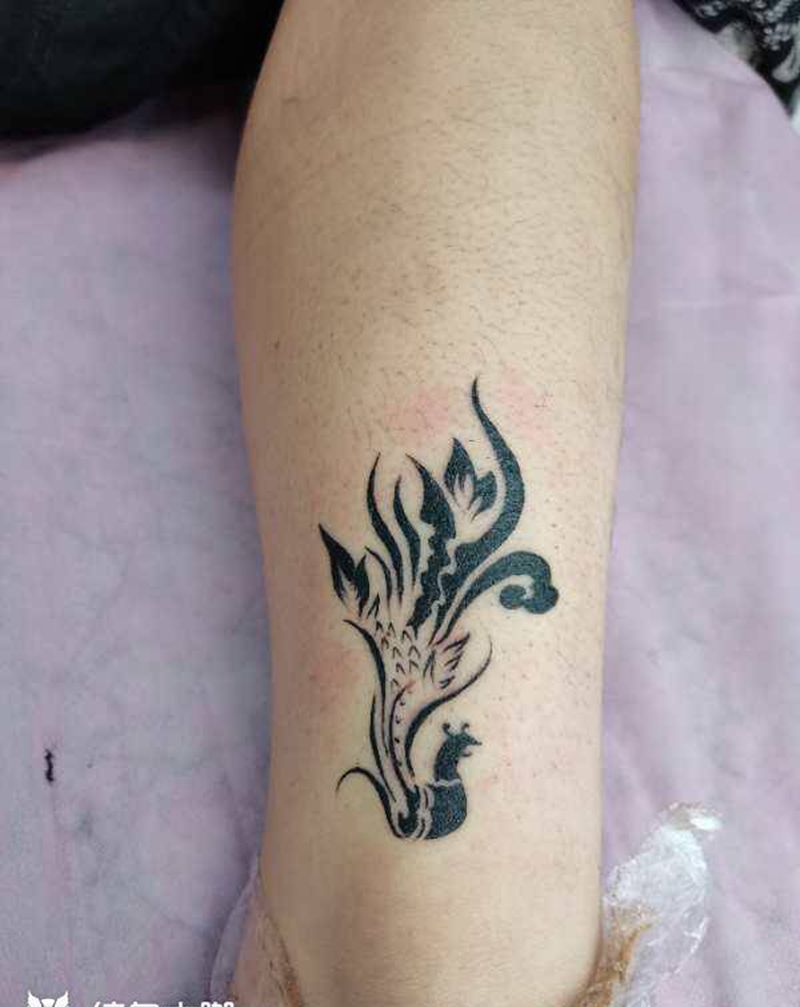 图腾凤凰纹身图片_腿部纹身图案