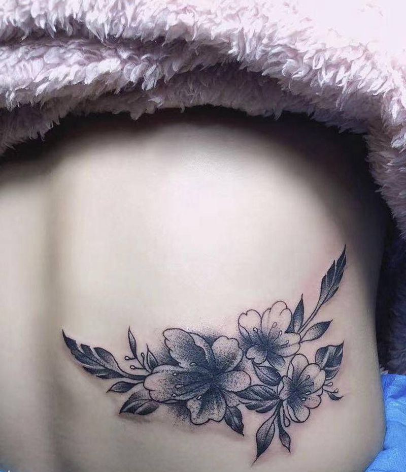 素花纹身图片_腰部纹身图案