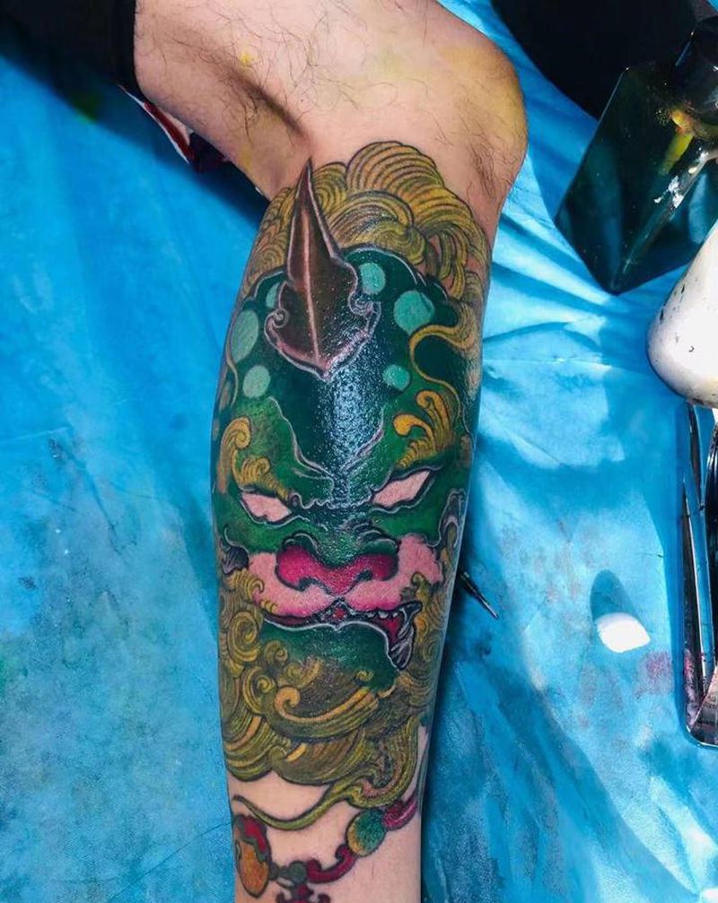 谛听纹身图片_腿部纹身图案