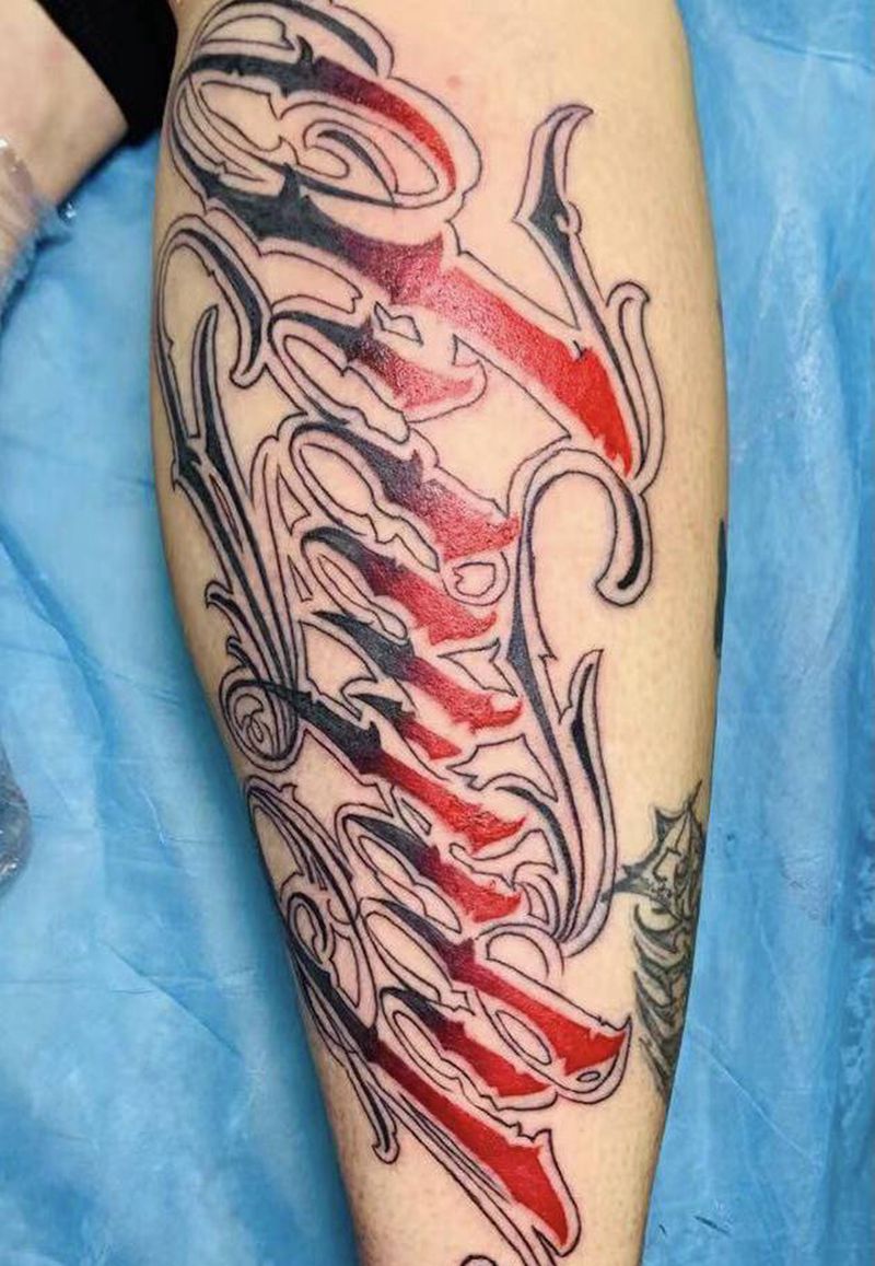 花体字纹身图片_腿部纹身图案