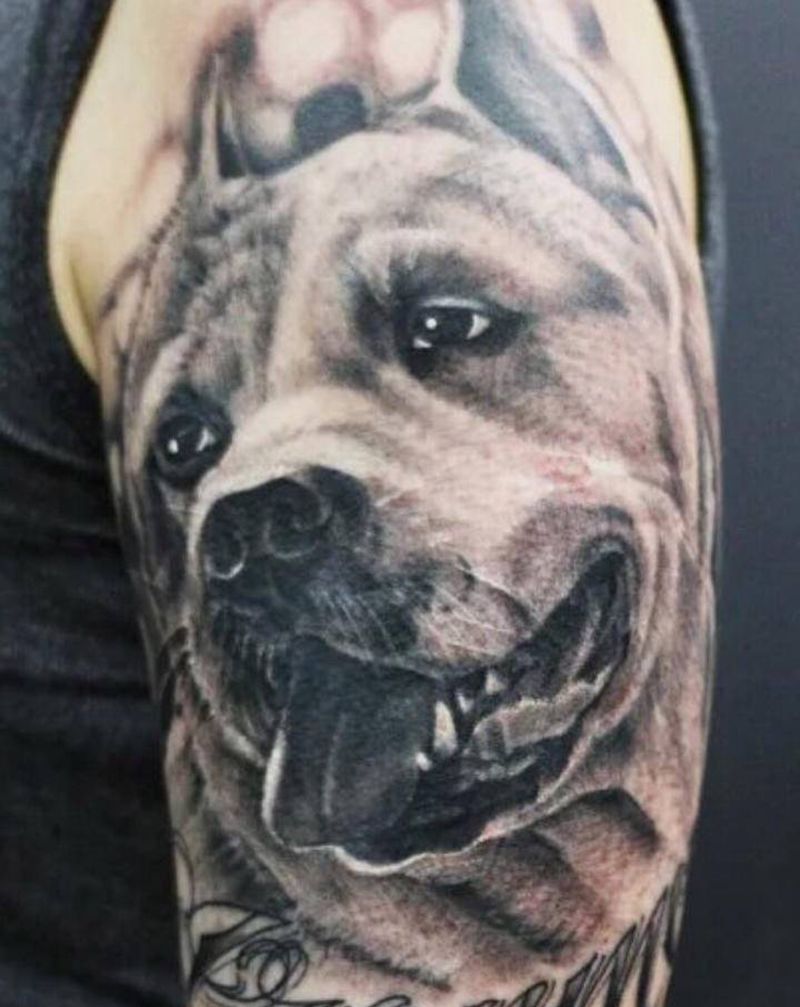 大臂写实作品纹身图片_手臂欧美写实纹身图案