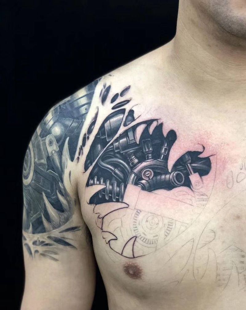 机械与心的缔造纹身图片_胸部欧美写实纹身图案