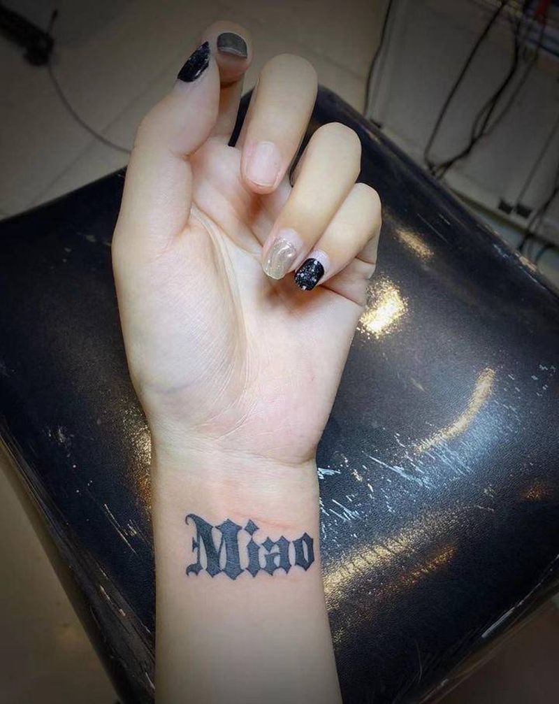 喵纹身图片_手臂图腾纹身图案