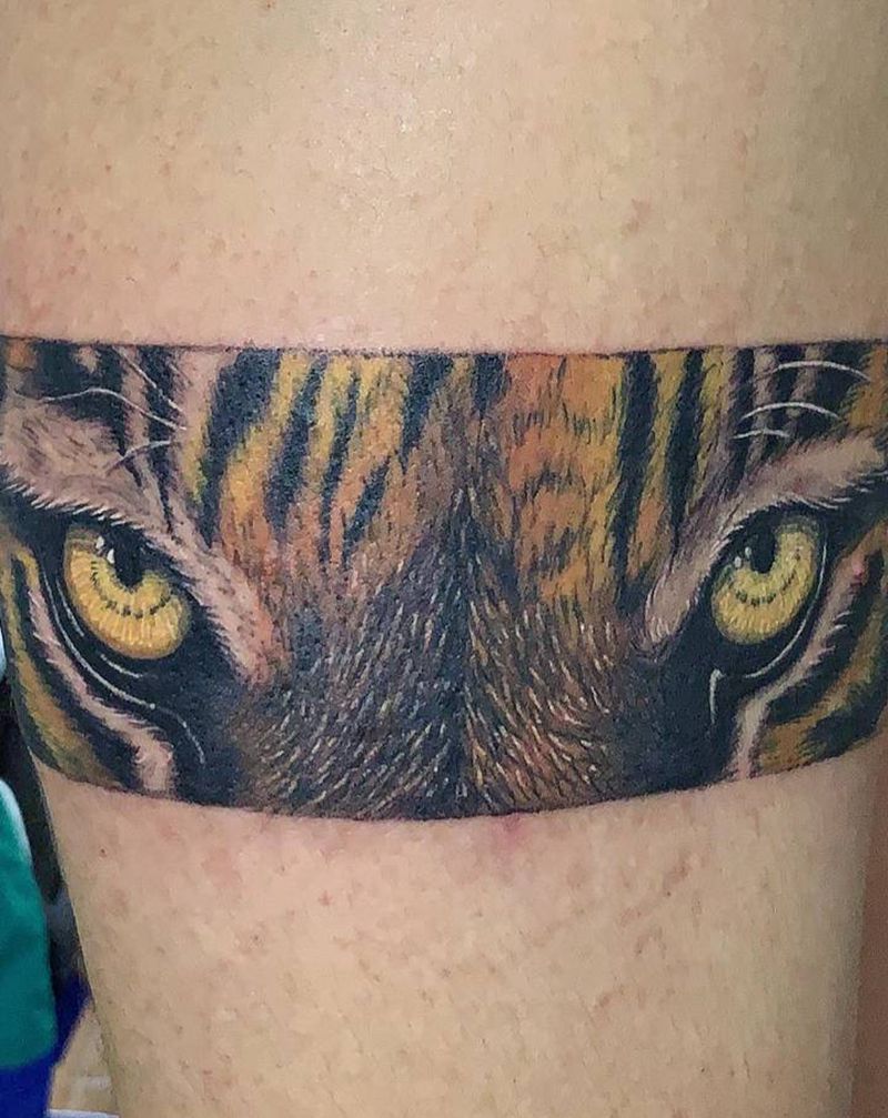 老虎眼睛臂环纹身图片_手臂欧美写实纹身图案