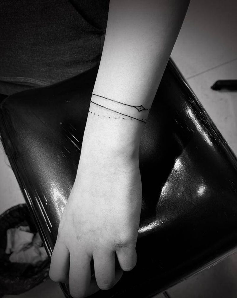 线纹身图片_手臂点刺纹身图案