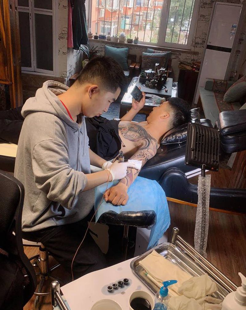 鲤鱼佛头纹身图片_手臂纹身图案