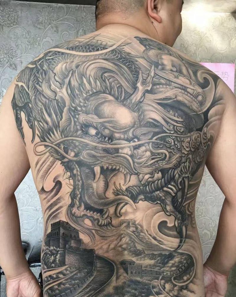 龙游华夏纹身图片_背部纹身图案