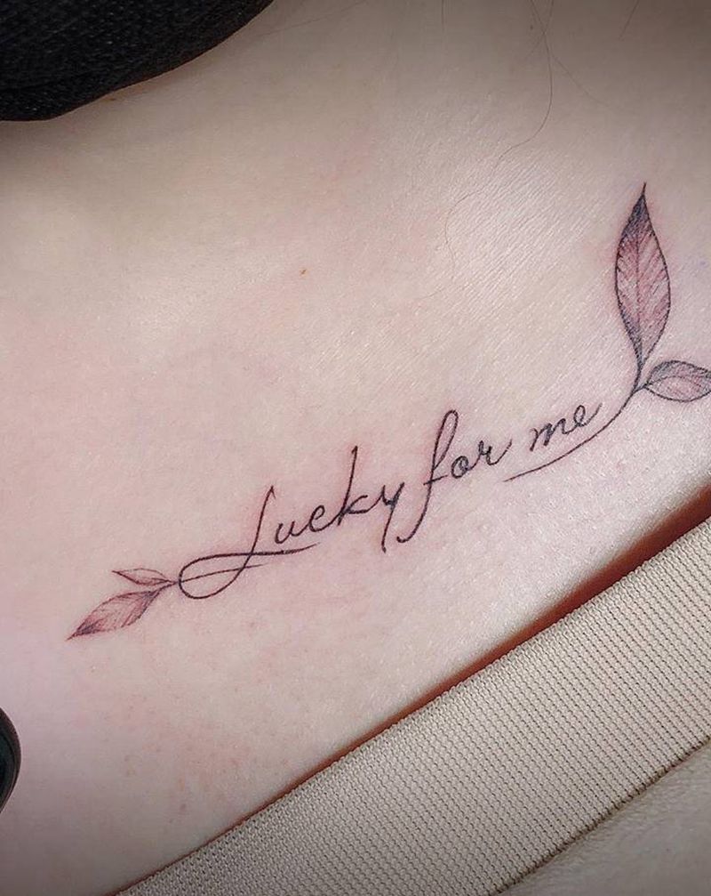 字母叶子纹身图片_肩部胸部纹身图案