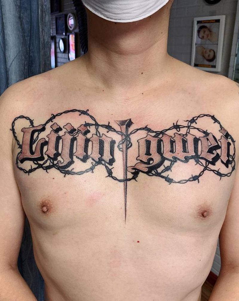 花胸纹身图片_胸部花体字纹身图案