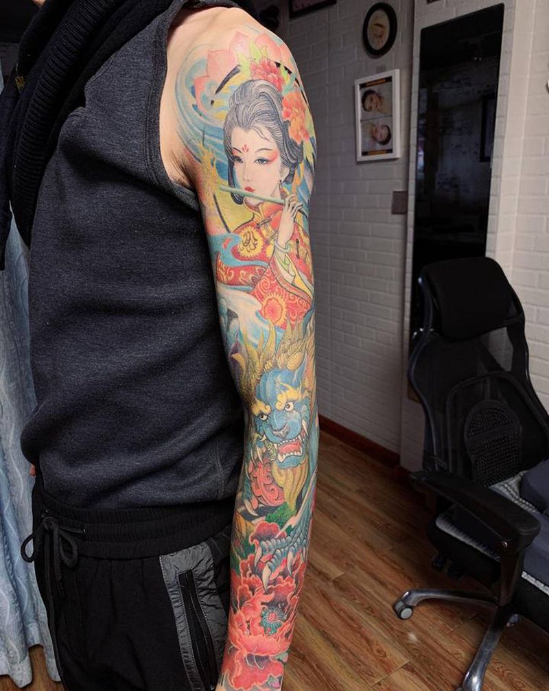 青衣牡丹纹身图片_手臂新传统纹身图案