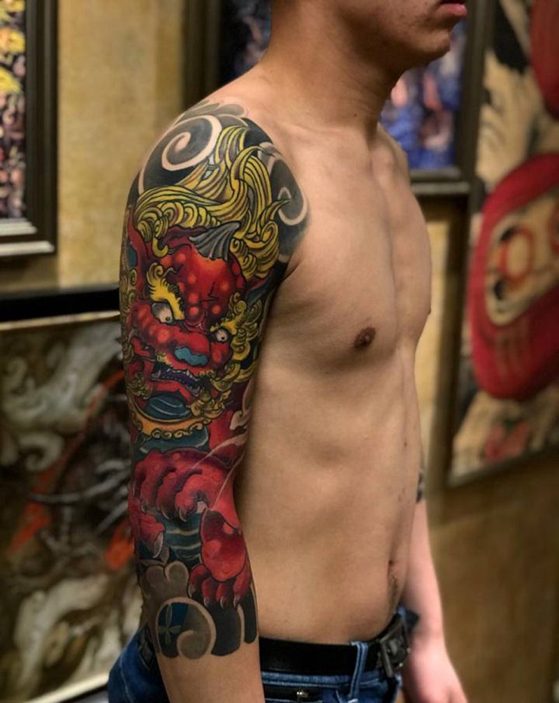 唐狮花臂纹身图片_手臂新传统纹身图案