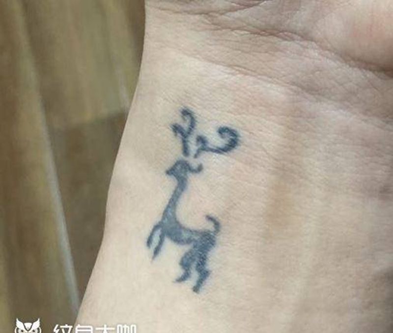 荧光遮盖纹身图片_手部手臂Old School纹身图案