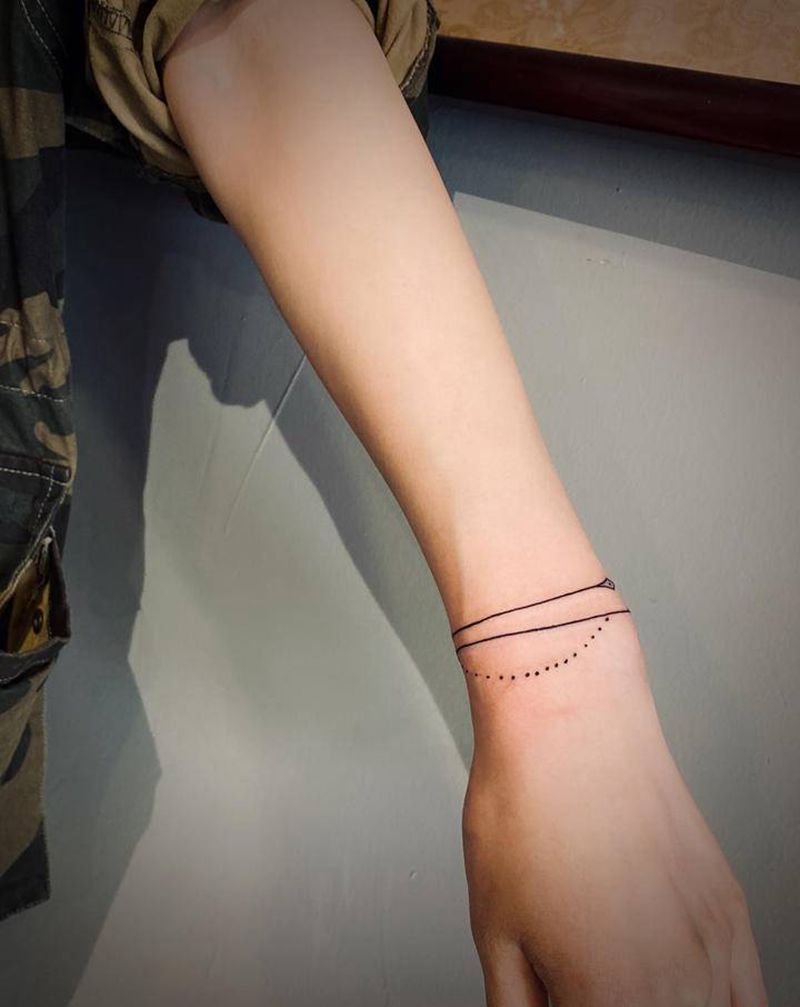 线纹身图片_手臂点刺纹身图案