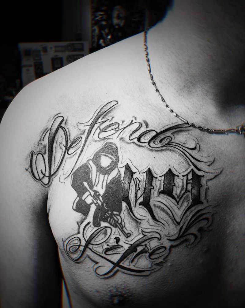 字纹身图片_胸部花体字纹身图案