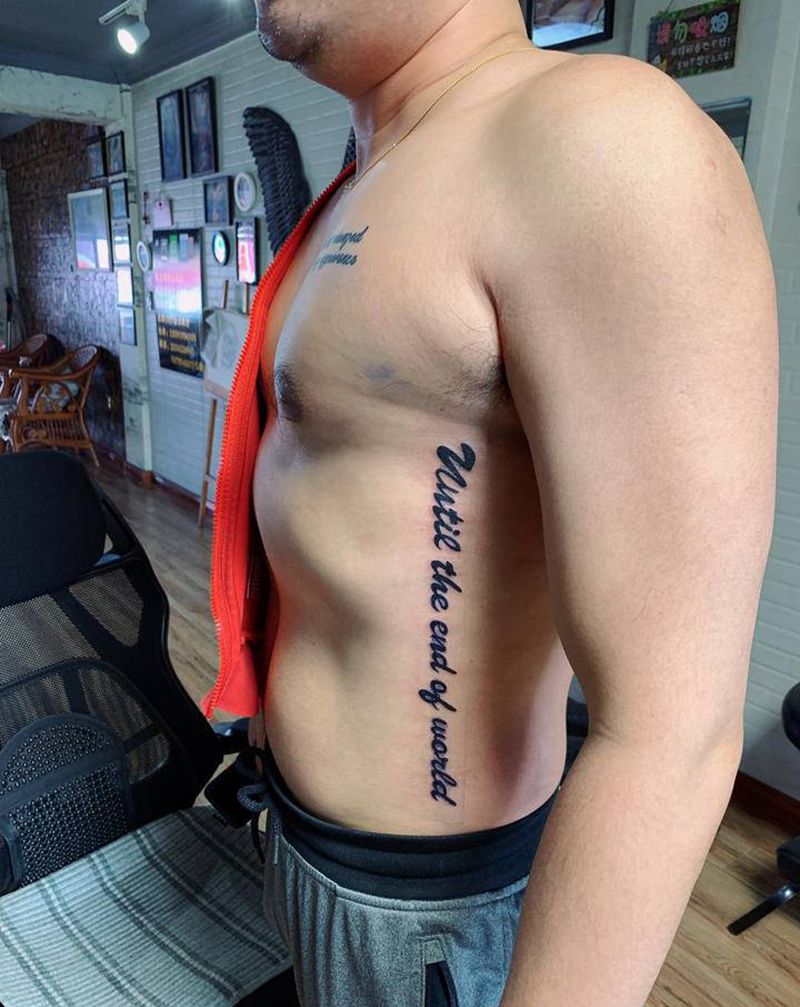 字母纹身图片_腹部花体字纹身图案