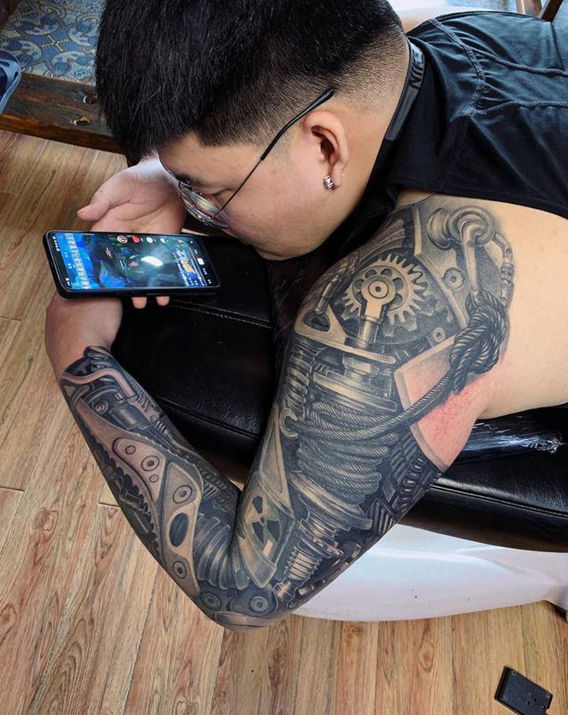 机械臂纹身图片_手臂欧美写实纹身图案