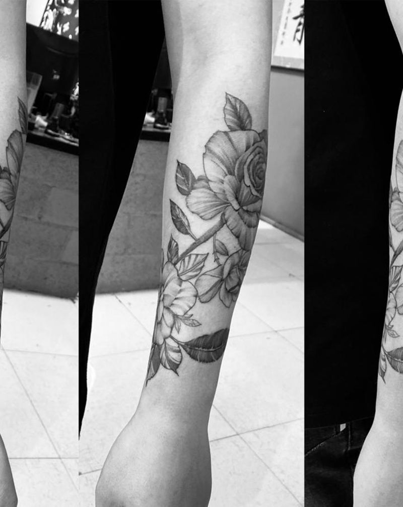 花纹身图片_手臂点刺纹身图案