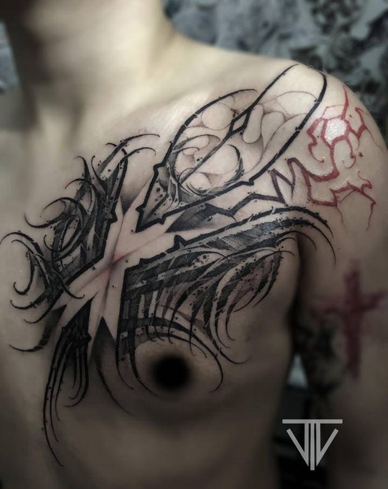 字母Xx纹身图片_胸部花体字纹身图案