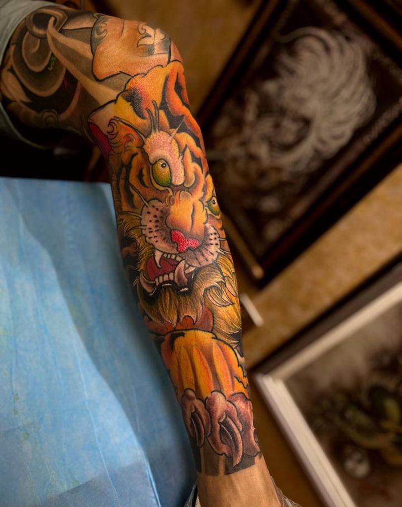武松打腿花虎未完成纹身图片_腿部新传统纹身图案