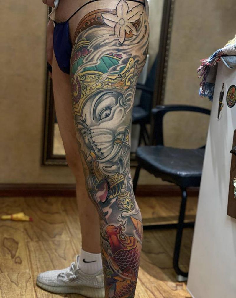 象神鲤鱼花腿纹身图片_腿部新传统纹身图案