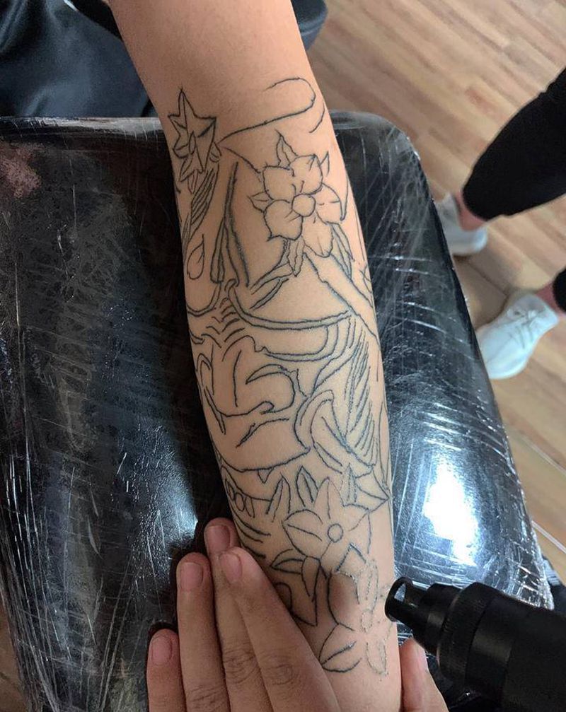 毁皮纹身图片_手臂纹身图案