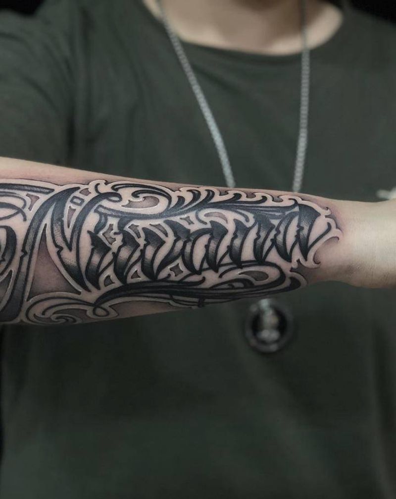 奇卡诺花体纹身图片_手臂花体字纹身图案