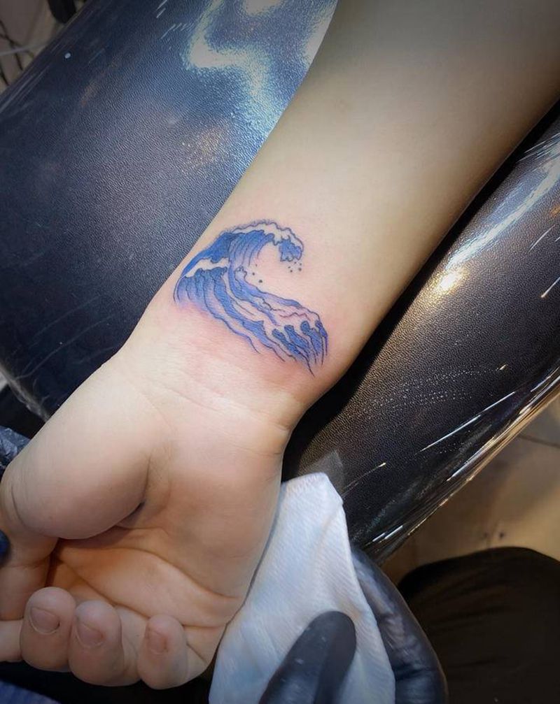 浪花纹身图片_手臂水彩纹身图案