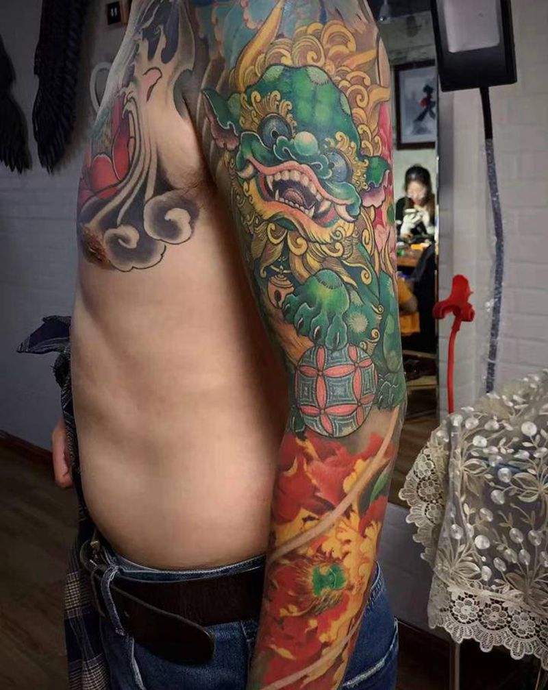 唐狮牡丹纹身图片_唐狮牡丹纹身图案